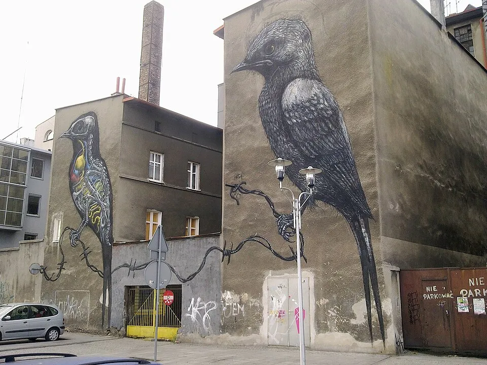 A contemporary street art mural on an urban wall, demonstrating how art exists outside museums, the kind of art that teenagers encounter in their daily lives and that can serve as a bridge to art appreciation