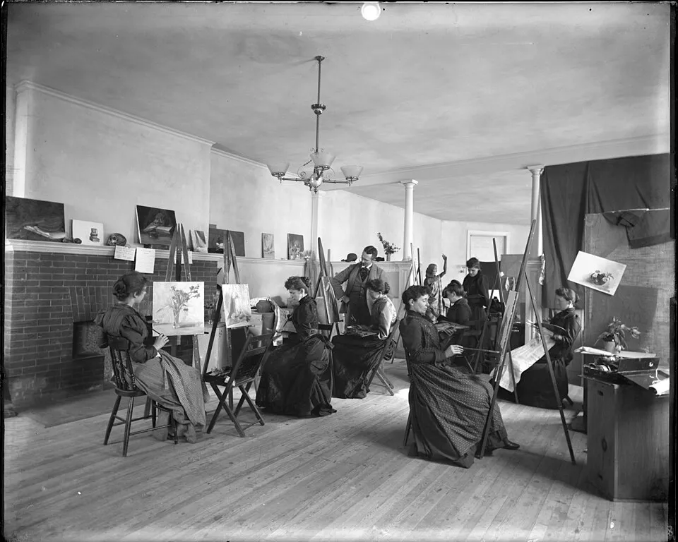 Teenagers working on art projects in a classroom setting, painting and drawing with focused engagement, demonstrating that art appreciation for teens is most effective when it includes hands-on making, not just looking