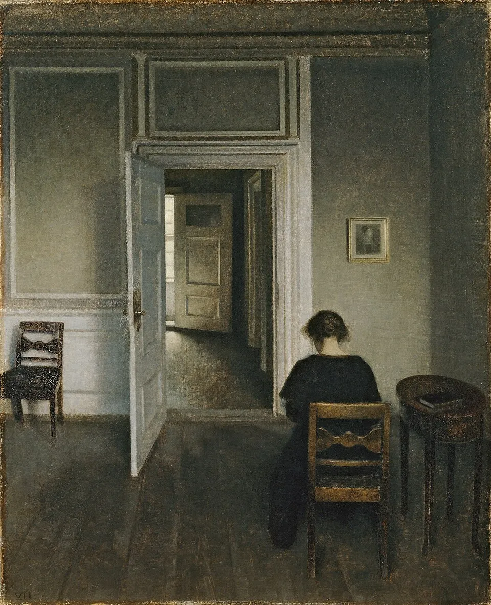 Vilhelm Hammershoi's Interior No 30 Strandgade 1906, a small apartment interior with a single artwork on the wall, demonstrating the principle that one well-placed piece in a small space is more powerful than many small ones