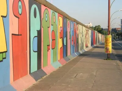 The East Side Gallery in Berlin, the largest remaining section of the Berlin Wall, painted by international artists in 1990 after the fall of the Wall, turning a symbol of division into the world's largest open-air mural gallery