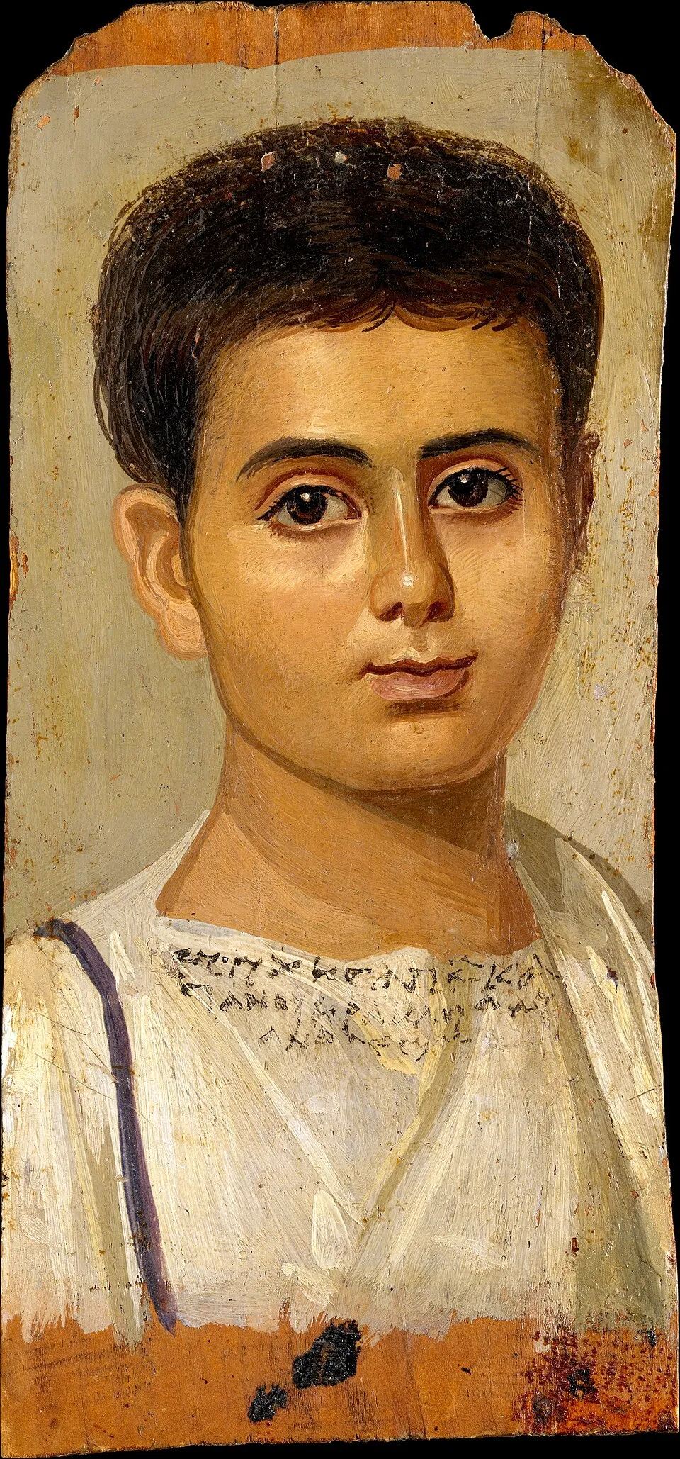 Portrait of the Boy Eutyches (100-150 CE), encaustic on wood, showing a young boy with large brown eyes and curly hair, from Roman-period Egypt