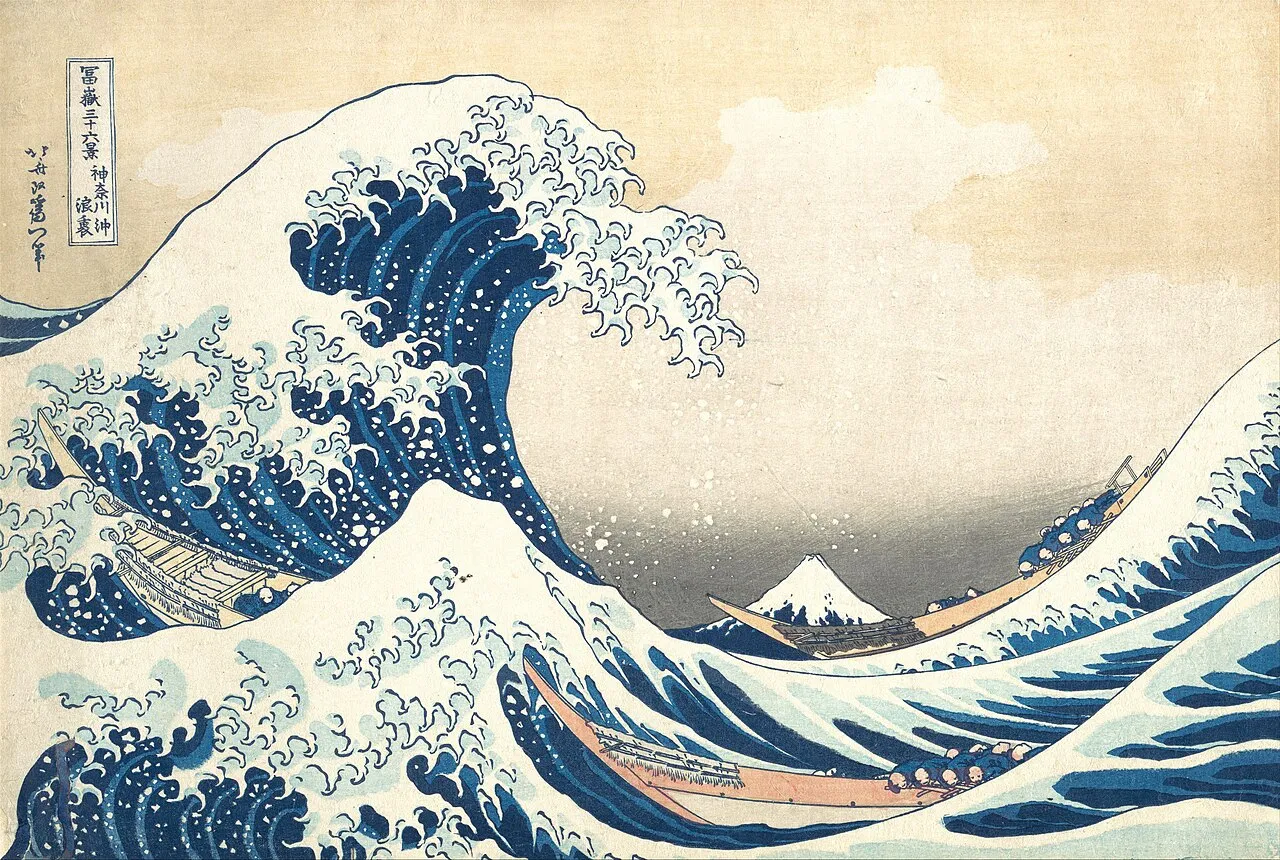 The Great Wave off Kanagawa (c. 1831) by Katsushika Hokusai, showing the dramatic balance between the active positive space of the wave and the calm negative space of sky and sea behind it