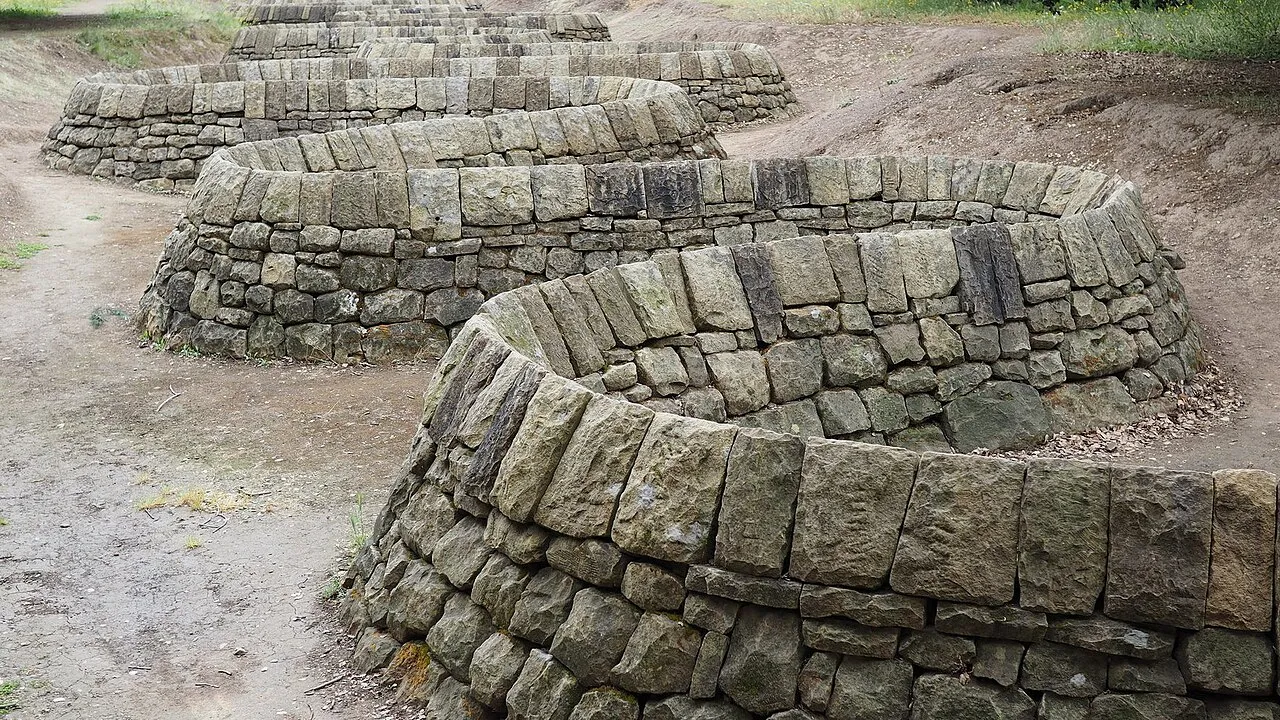 Stone River (2001) by Andy Goldsworthy at Stanford University, a serpentine dry-stone wall made of red sandstone that flows through the landscape like a river, a permanent land art installation