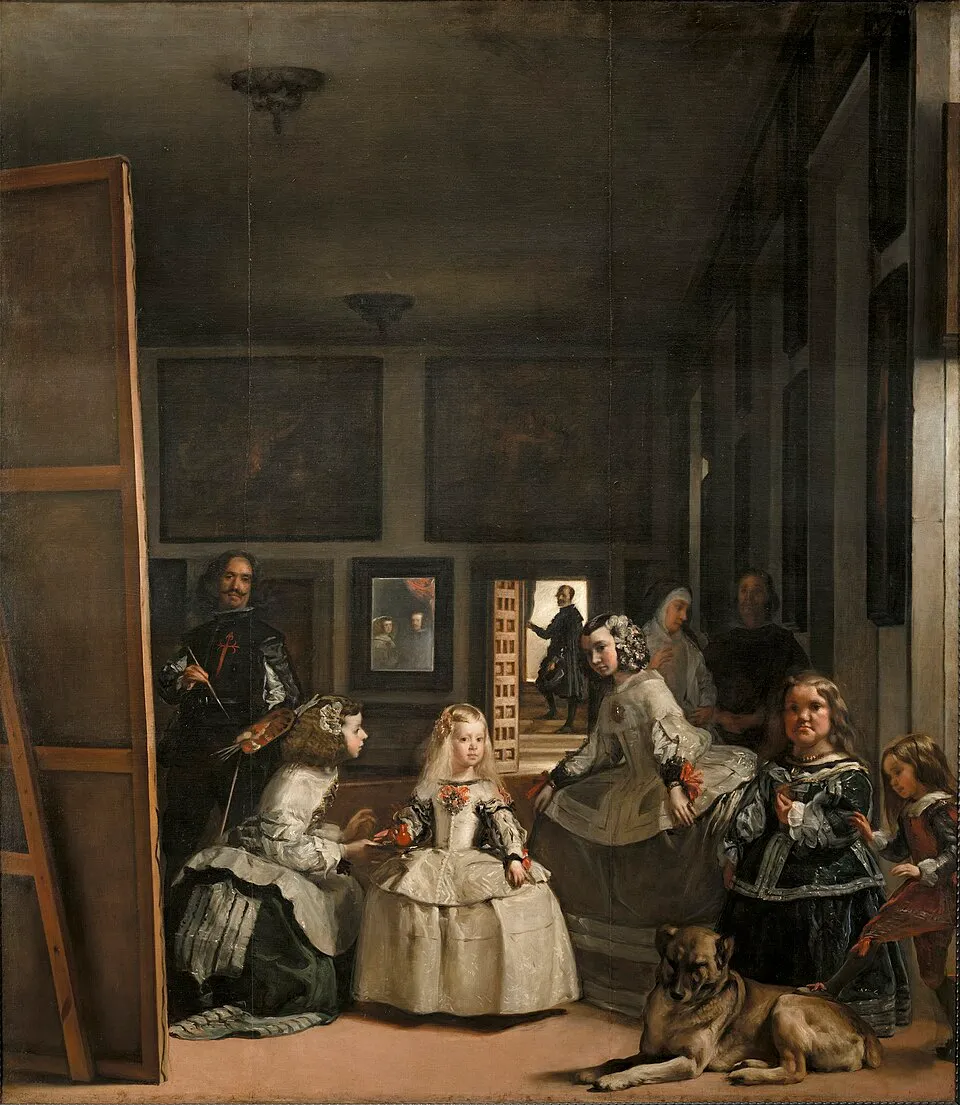 Las Meninas (1656) by Diego Velázquez showing the Infanta Margarita attended by her ladies-in-waiting and court figures in a large studio space, with Velázquez visible at the left behind a large canvas and a small mirror on the back wall reflecting the king and queen