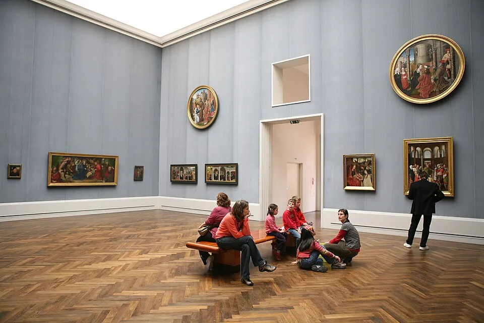 The Gemäldegalerie in Berlin, showing a long gallery with paintings hung on both walls and natural light from skylights above