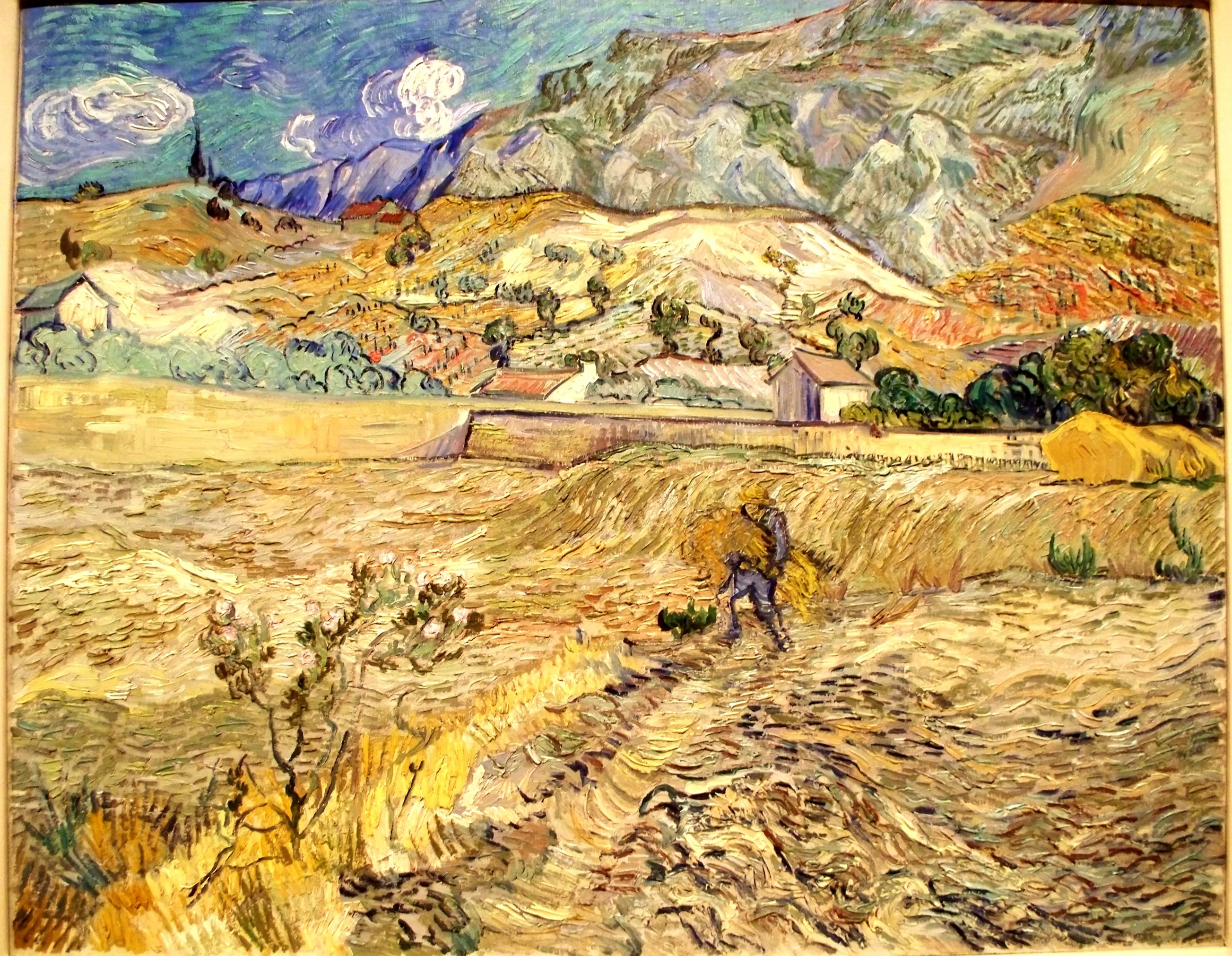 Close-up detail of Van Gogh's The Starry Night showing thick layers of paint in swirling patterns