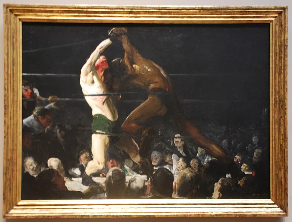 George Bellows, Both Members of This Club (1909). Two boxers, one Black and one white, fighting in a private club ring surrounded by a tightly packed crowd.
