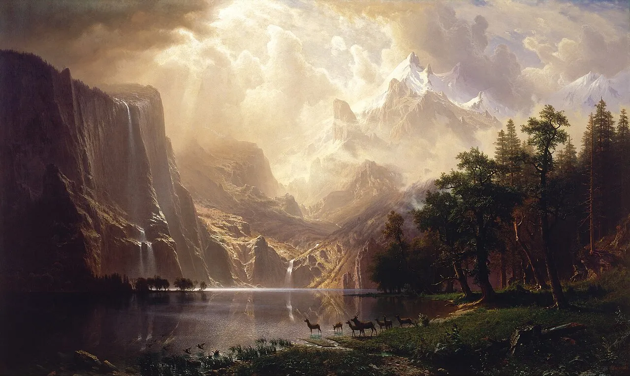Albert Bierstadt, Among the Sierra Nevada, California (1868). A luminous mountain lake surrounded by peaks, with deer at the water's edge and dramatic cloud formations above.