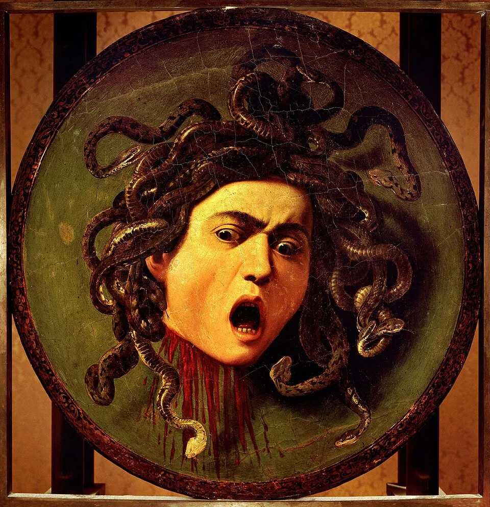 Caravaggio, Medusa (c. 1597). A shield painted with the severed head of Medusa, her face frozen in a scream with snakes for hair and blood streaming from her neck.