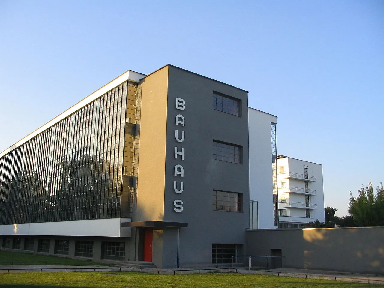 The main building of the Bauhaus school in Dessau, Germany, designed by Walter Gropius with its iconic glass curtain wall facade